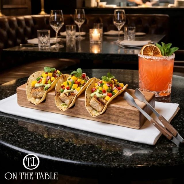 Taco 'Bout Versatile. 🌮
Three slots. Endless possibilities.

@onthetablellc knows great presentation starts with the right serving piece. These dishwasher-safe acacia serving boards are perfect for tacos, appetizers, mini churros, and more—making every bite look like it belongs on the menu.

Message us to learn more about On The Table’s serving solutions.